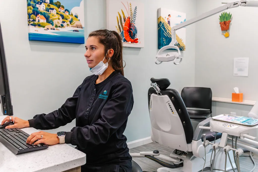 A member of the Montshire oral surgery team in a treatment room.
